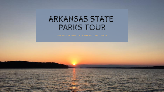 Sunset on DeGray Lake with text "Arkansas State Parks Tour: Adventure Awaits in the Natural State"